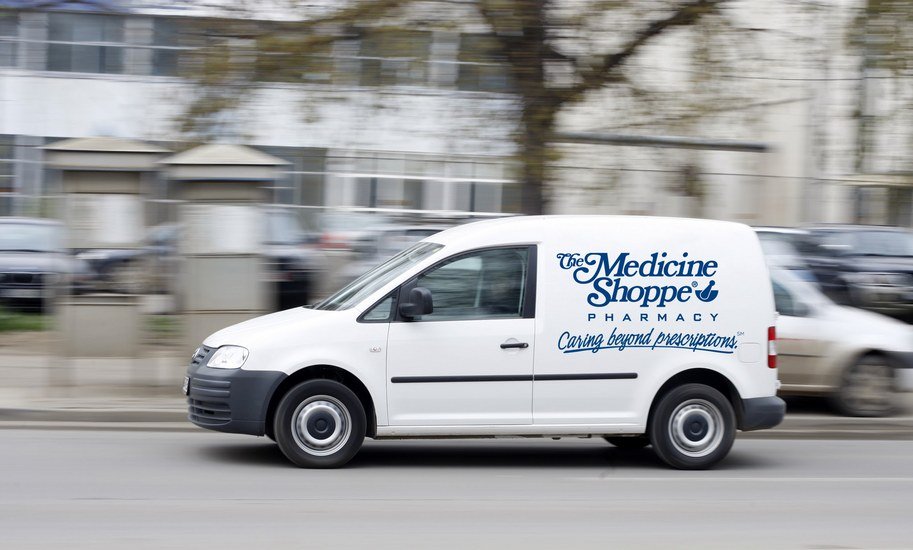 A delivery vehicle with the Medicine Shoppe logo on the side Delivery